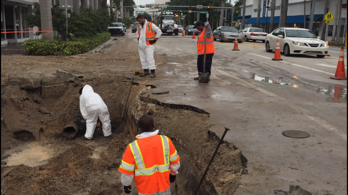 A broken water main in Miami Beach has filled a road with water, affecting traffic.