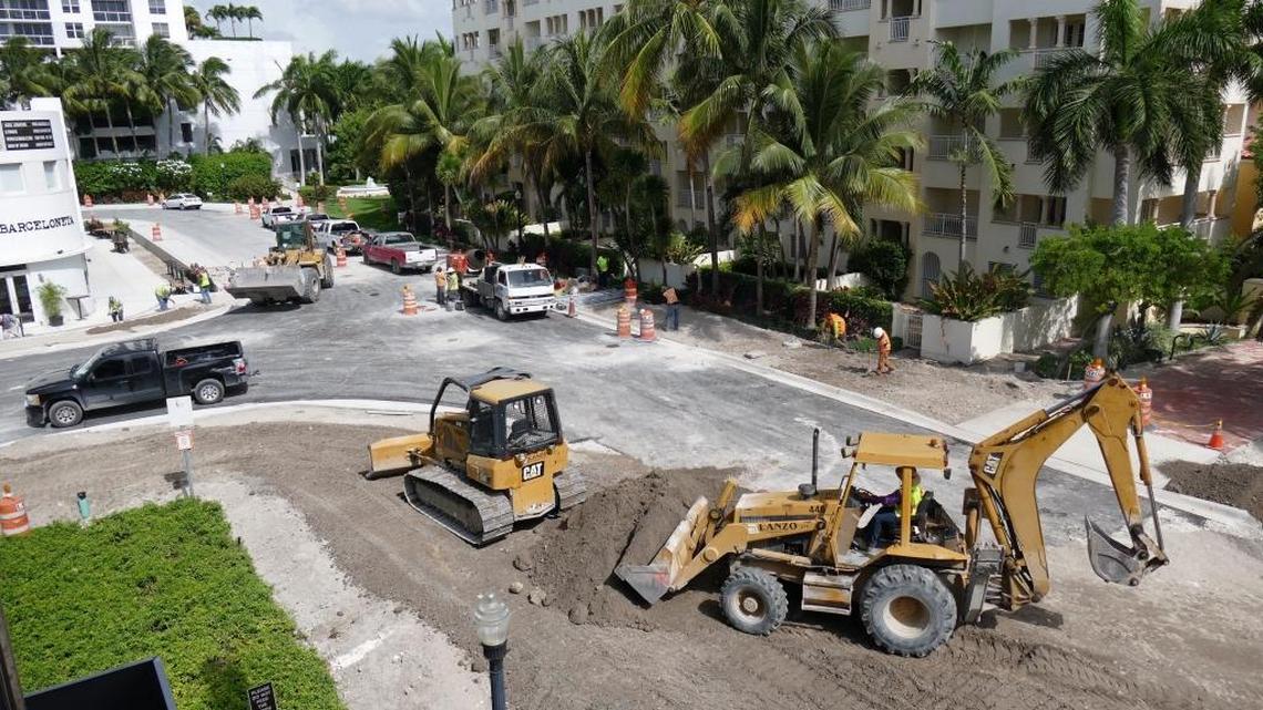 Construction workers work on raising the height of the street and sidewalks in front of the Miami Beach Publix on 20th Street and Bay Road back in 2015.