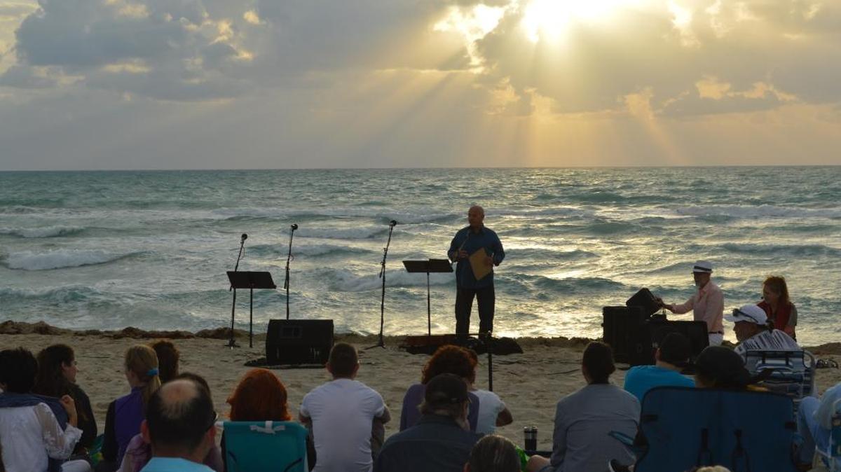 Calvary Chapel Miami Beach Senior Pastor Robert Fountain speaks to the crowd at the beach on Easter Sunday 2017.