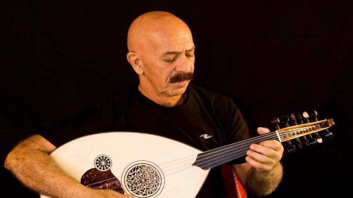 Joe Zeytoonian plays the oud, an eleven-stringed lute, which he will also play during the Armenian Commemorative Concert.