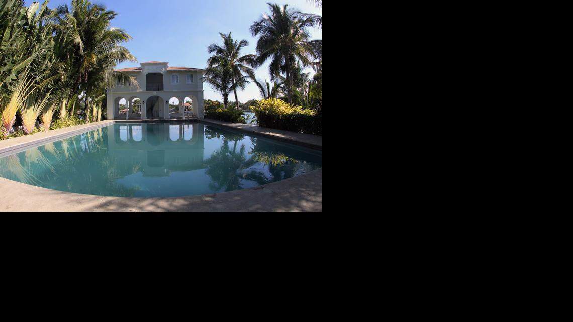 
A view from the pool to the gardens of the remodeled Al Capone mansion on Palm Island in Miami Beach, March 18, 2015. The home has been restored for video and photo shoots.
