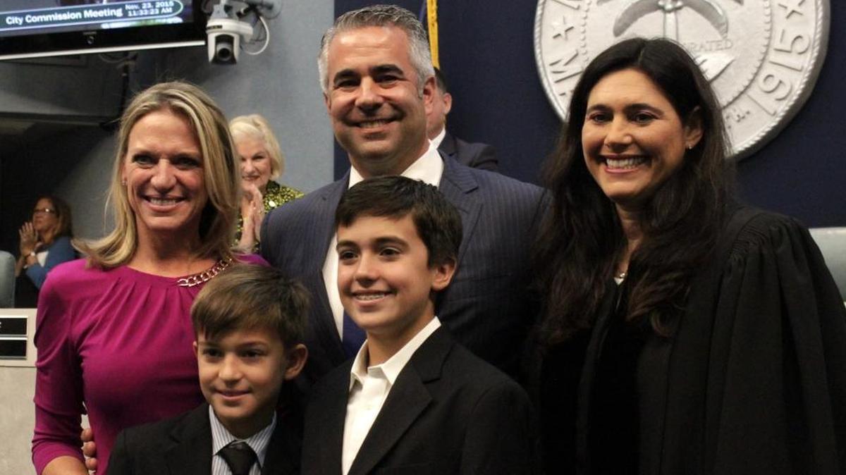 John Elizabeth Alemán, left, with her husband JB, sons Evan and Jake and Judge Mindy Glazer, at her swearing-in ceremony as a Miami Beach commissioner four years ago. Friday, she was chosen to run Miami’s Downtown Development Authority.