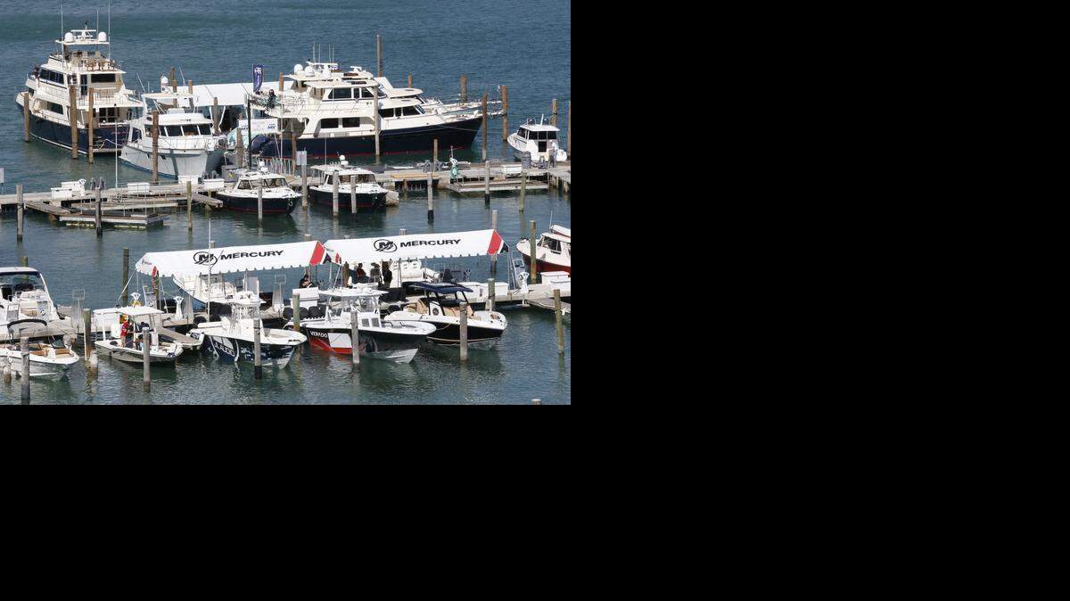 
Boats sit docked at Sea Isle Marina as preparations are underway for the annual Miami International Boat Show on Tuesday, Feb. 10, 2015.
