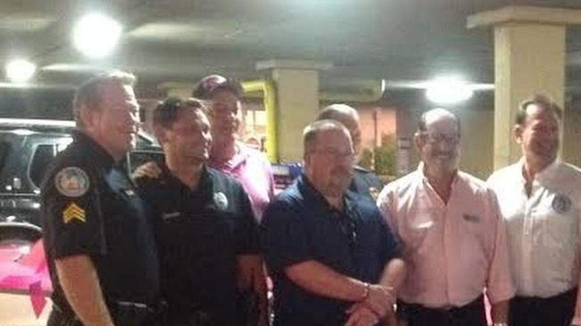 Then-Police Chief Carlos Noriega, fourth from the left in the front row, and other North Bay Village Police Department personnel kicked off Breast Cancer Awareness Month in October 2016. Noriega has since been fired — improperly, according to his lawsuit.