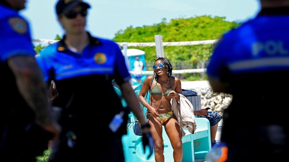 Police officers are out in force to keep the peace and to make sure visitors and locals enjoy the Urban Weekend festivities on South Beach On Sunday, May 29, 2016. Composing of several police agency, police canvas Ocean Drive and other areas keeping a strong presence during the Memorial Day weekend.