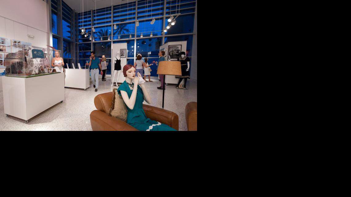 
historical perspective: Visitors check out the Miami Beach history exhibit at the Art Deco Welcome Center in Miami Beach on Tuesday, Oct. 7. The center opened for a lecture by Miami Beach historian Seth Bramson on the history of the city.
