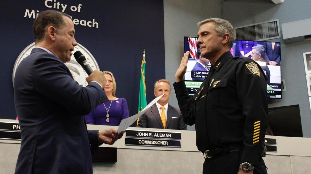 Richard Clements, right, was sworn in as Miami Beach’s new deputy police chief at Wednesday’s City Commission meeting.