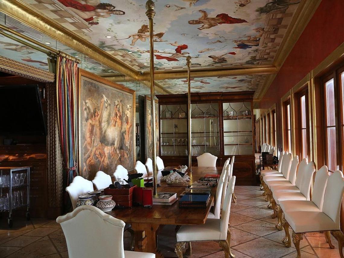 All the personal items and artworks in the main dining area (including stripper poles) are up for auction inside the two Star Island mansions that used to belong to Thomas Kramer.