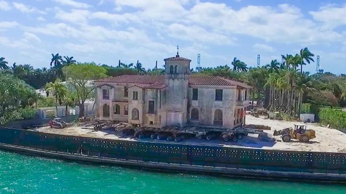 The 7,000 square-foot home at 22 Star Island Drive was lifted up on hydraulic dollies Wednesday and moved to another part of the property.