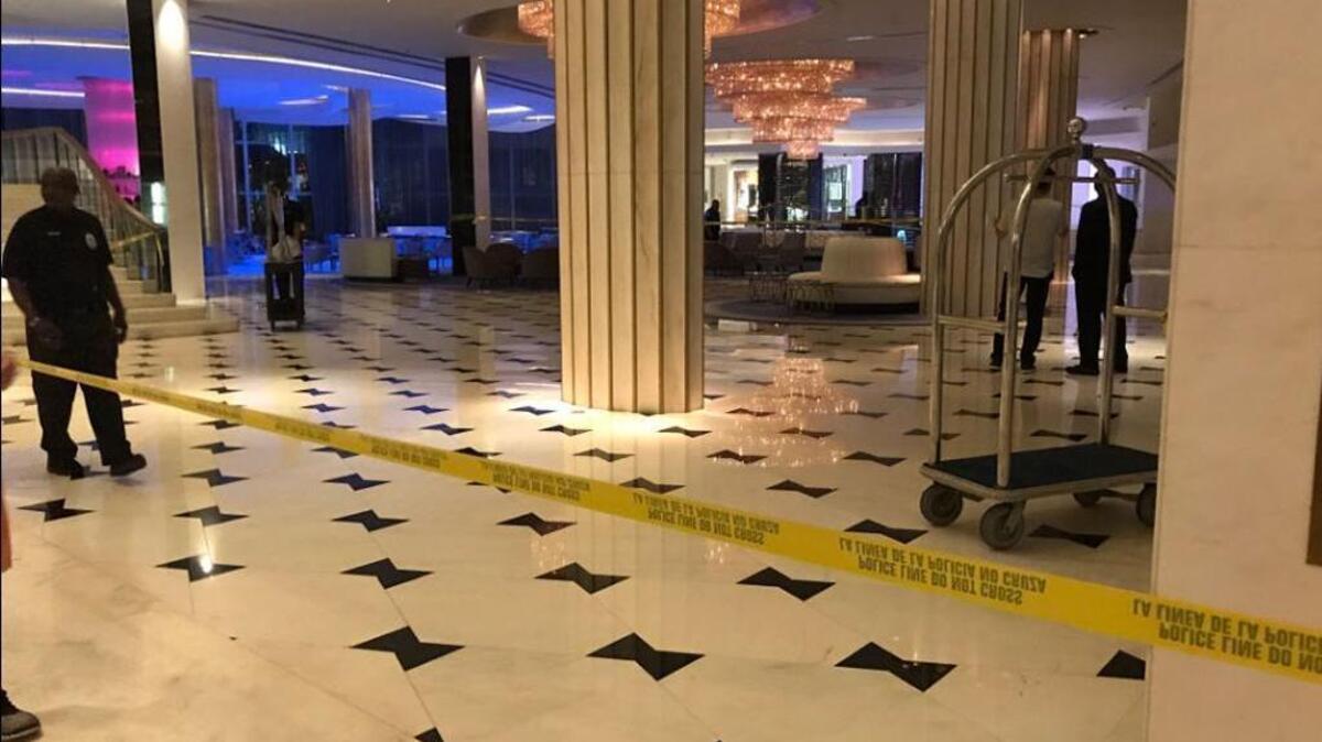 The lobby of the Fontainebleau hotel in Miami Beach is taped off as police investigate a shooting on Sunday, May 7, 2017.