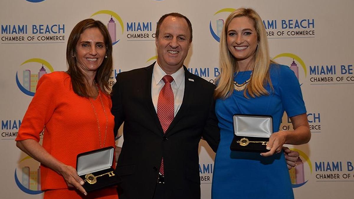 Toni Rakow-Lester, Michael S. Goldberg and Erica Rakow at recent Miami Beach Chamber of Commerce breakfast honoring Miami Beach first responders. Goldberg and Erica Rakow will emcee the May 7 gala.