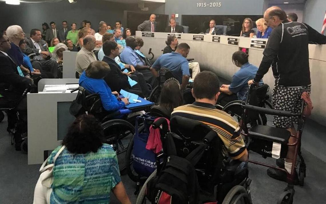 Supporters and opponents of a planned beachside facility for people with disabilities filled the Miami Beach commission chamber in July 2017.