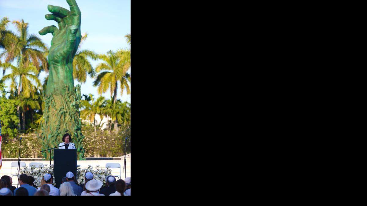 
On Sunday, hundreds are expected to gather for the annual Holocaust Remembrance Day at the Holocaust Memorial Miami Beach. Pictured, Wendy Reiss Rothfield, Holocaust Memorial Miami Beach Committee Member, speaks in front of a crowd of hundreds at last year’s ceremony.


