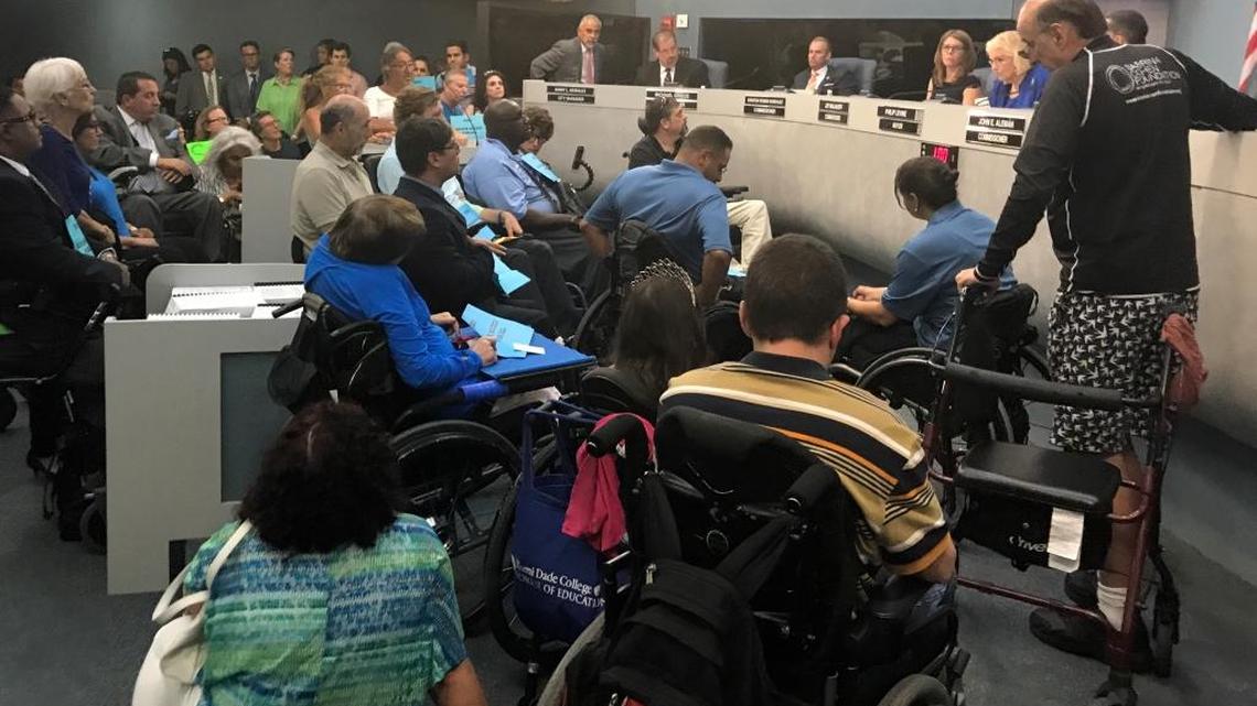 Supporters and opponents filled the Miami Beach commission chamber Wednesday for the vote on whether the city would allow the Sabrina Cohen Foundation to use a beachside city-owned building to store equipment used by people with disabilities to swim in the ocean.