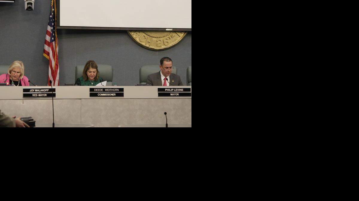 
Miami Beach City Commissioners Joy Malakoff, Deede Weithorn and Mayor Philip Levine review agenda items at Wednesday’s meeting.

