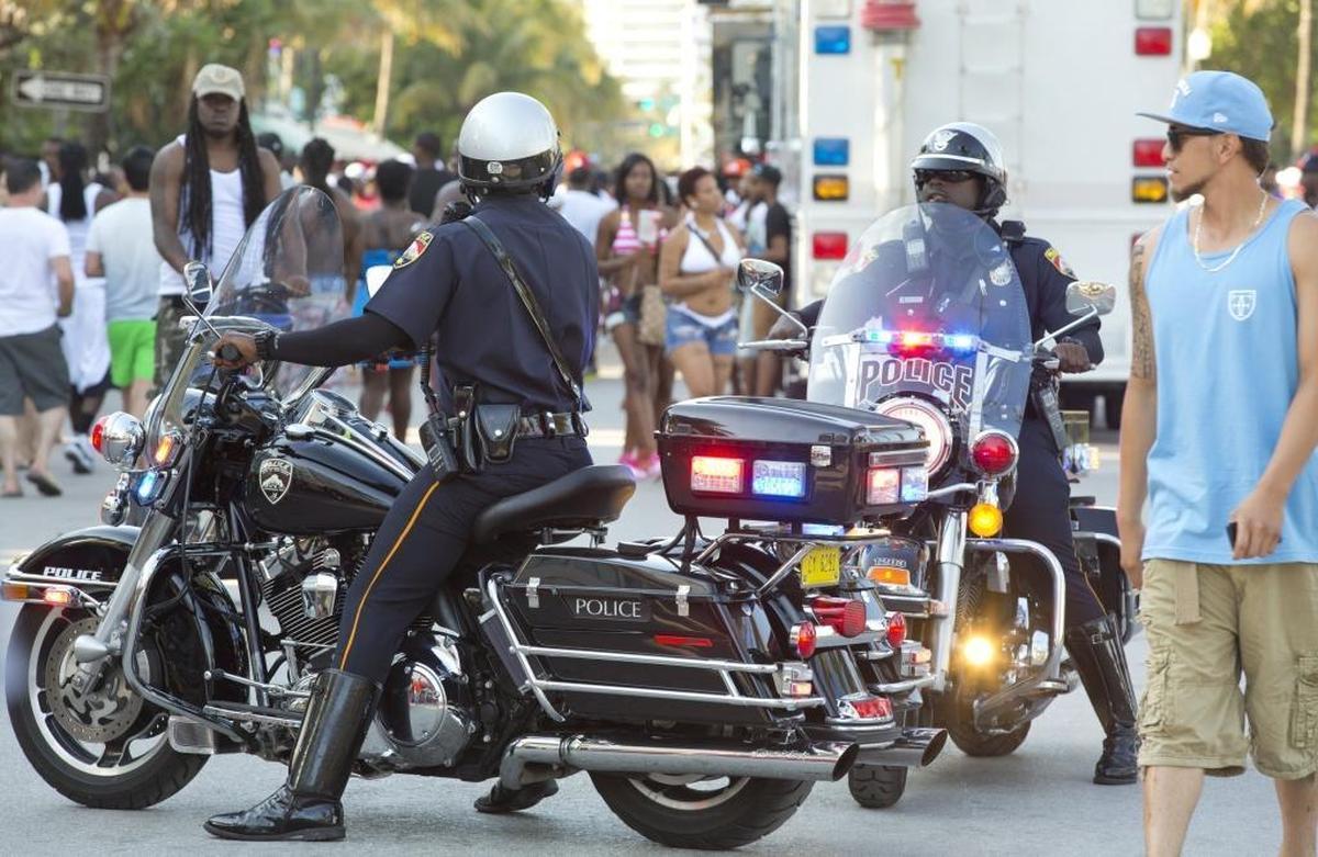 Heavy police presence, including motorcycle cops, is stationed on Ocean Drive during Urban Beach Week.