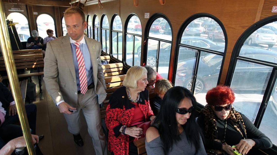 City of Miami Beach Commissioner Michael Grieco walks inside the new trolley during Thursday’s ribbon-cutting ceremony.