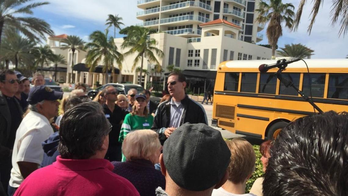 Thomas Mooney, planning director for Miami Beach, explains the current zoning regulations for Ocean Terrace in North Beach during a bus tour Saturday.