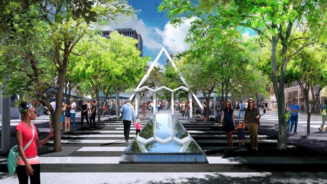 
Under the proposal, the current bosque and water feature on Lincoln Road’s 500 block are replaced with a design that opens up the center access. A linear reflective water feature cascades over a low runway wall.

