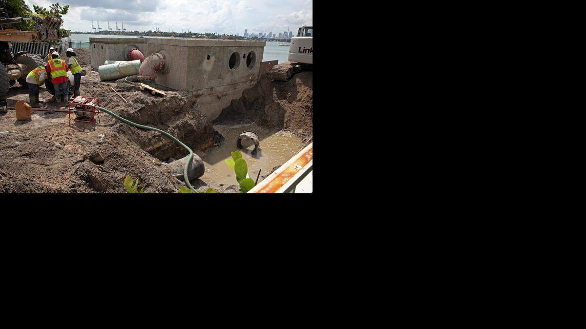 
An energy dissipator, seen here at 14th Street and West Avenue in Miami Beach on Monday, Oct. 6, 2014, is the last part of the water removal process. Water moves from street level into the bay, having gone through the pumping station, which is underground.
