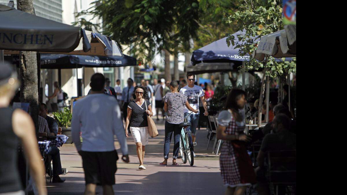 
People stroll along Lincoln Road Mall.
