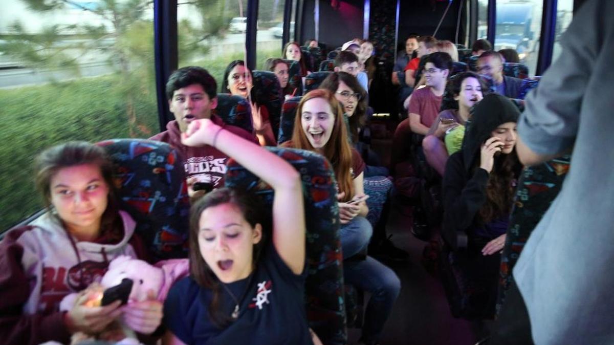 Marjory Stoneman Douglas students, Lindsey and Julia Salomone, front row, and Jose Iglesias and Isabelle Robinson rode on one of three buses that headed to Tallahassee on Feb. 20, 2018, to demand stronger gun control, a week after a mass shooting at their Broward school left 17 dead..