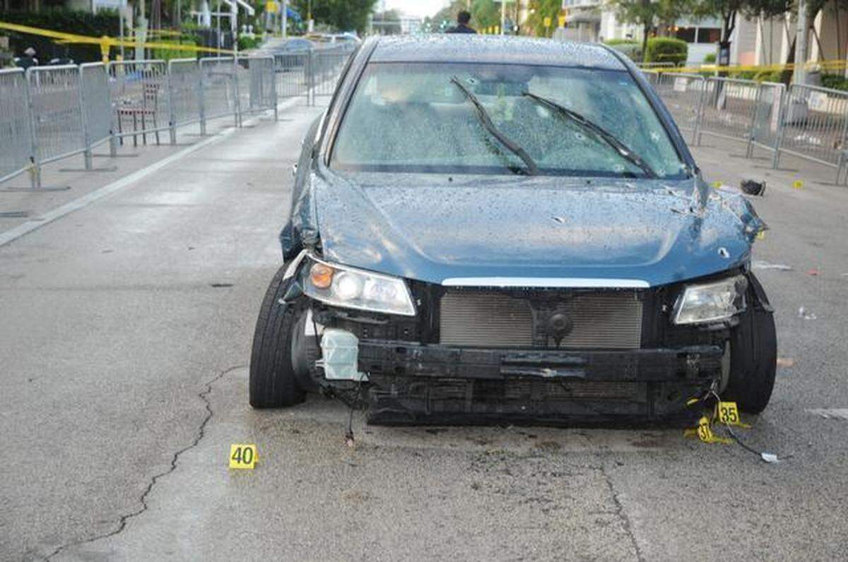 Raymond Herisse’s Hyundai Sonata, marked with police bullets and damage caused by numerous collisions as he sped away from officers.