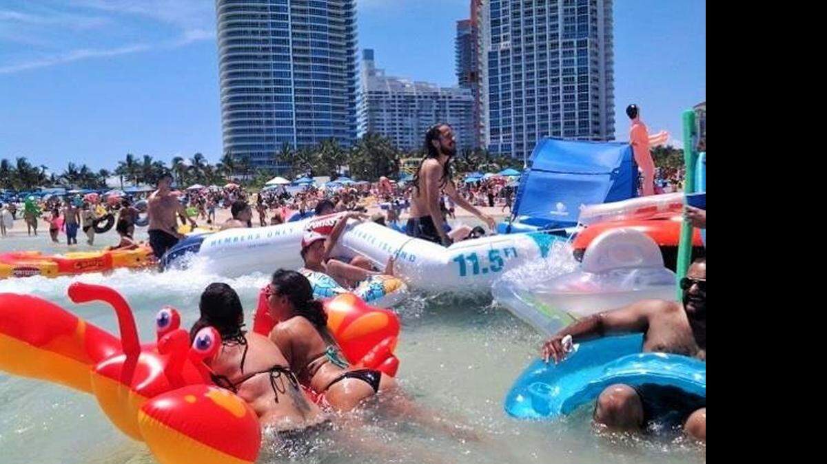 
Sun-bathers take to their floats during Floatopia, a free all-day ocean party where people are encouraged to take to inflatables of all shapes, sizes and colors. The free event took place on April 18  near South Pointe Park in Miami Beach. Story, 4.
