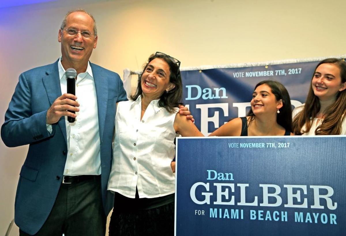 Dan Gelber stands with his wife, Joan Silverstein, and his daughters as he addresses supporters after being elected mayor of Miami Beach on Nov. 7, 2017.
