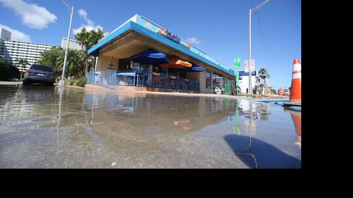 
Gov. Rick Scott axed $750,000 budgeted for Miami Beach’s storm water drainage plan to safeguard the city from sea-level rise. Above, flooding on Alton Road and 9th Street from king tide — the annual autumnal high tides which cause canals, rivers and coastlines to flood without any rain.
