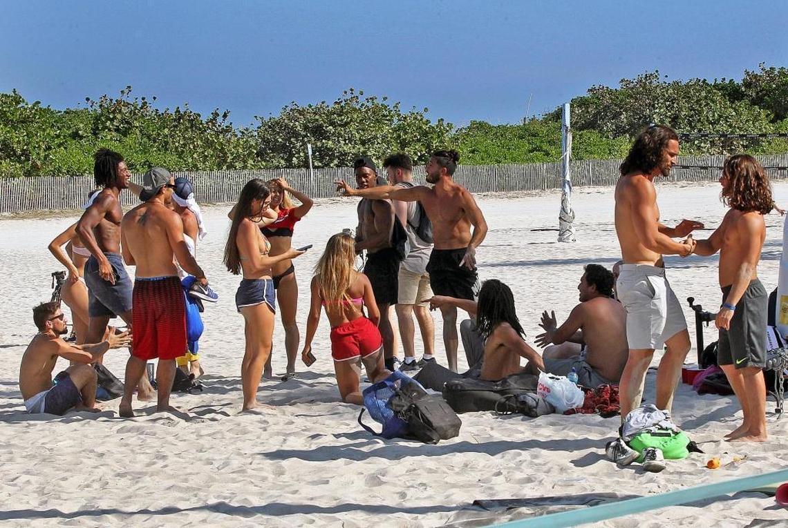 Although crowds are much smaller than on the weekend, Miami Beach is still jumping with activity as spring breakers and locals soak in the sun Tuesday on Ocean Drive.