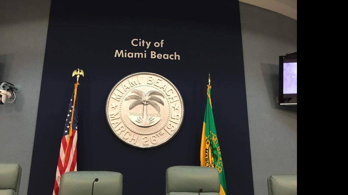 
The Miami Beach seal overlooks the dais at City Hall. The city is in the process of developing a transportation master plan that would outline the city’s transportation priorities for the next several years.
