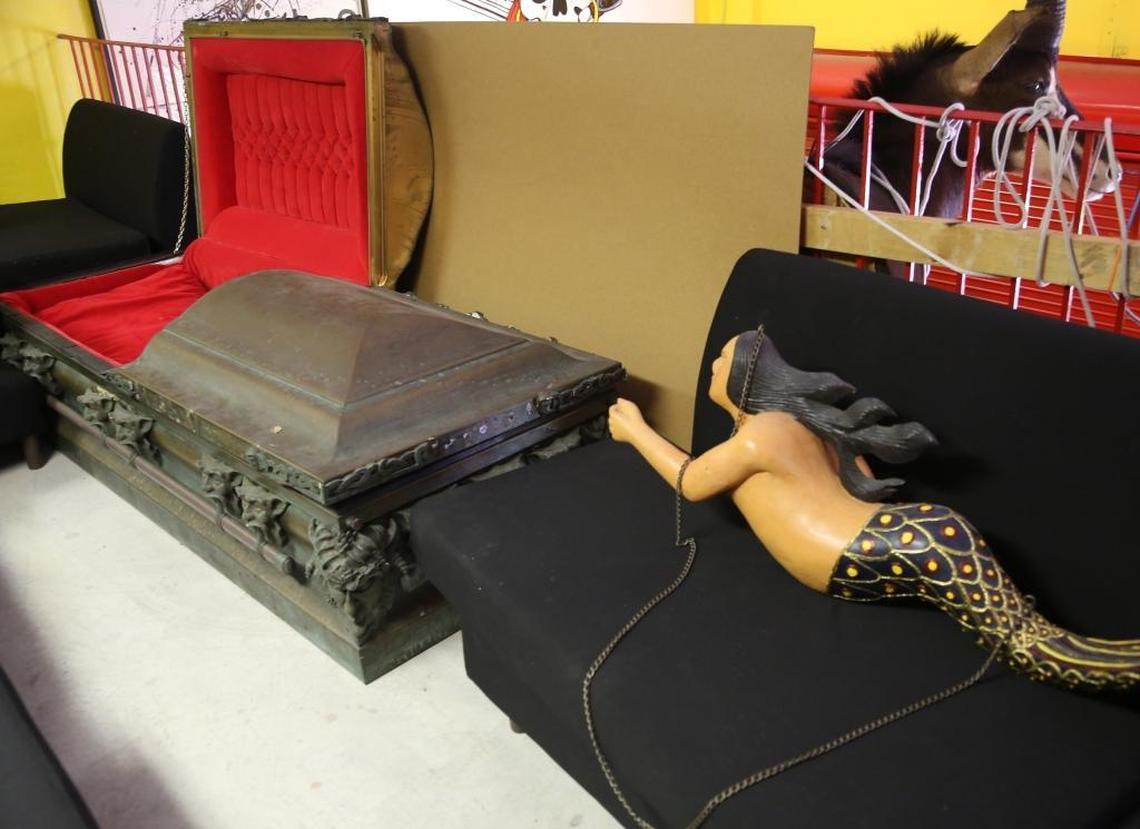 Strange props, including this cherry red lined coffin, are included in the sale of Thomas Kramer’s property.