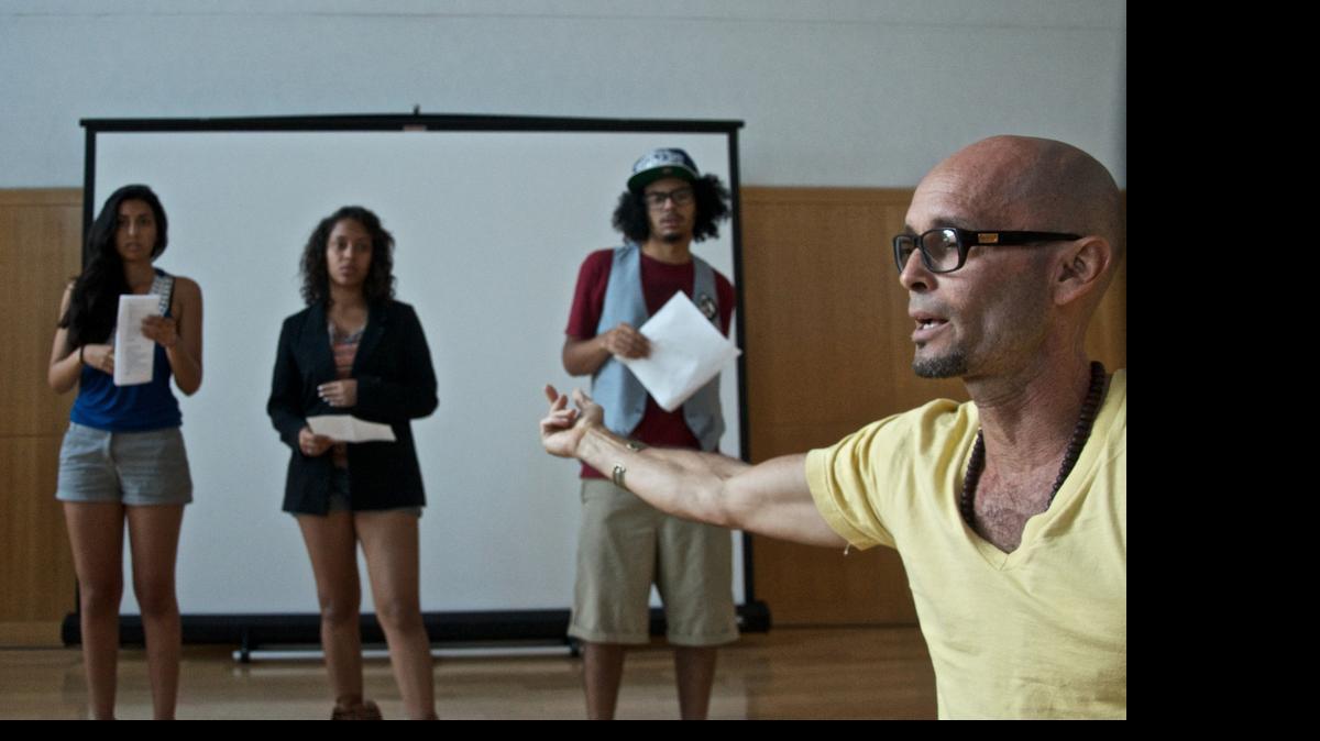 
In 2012: Teo Castellanos coaches the teenage WordSpeak team Alejandra Nuñz, Samantha Turner, 18, and Gio Garced, 19, during practice in Miami Beach.
