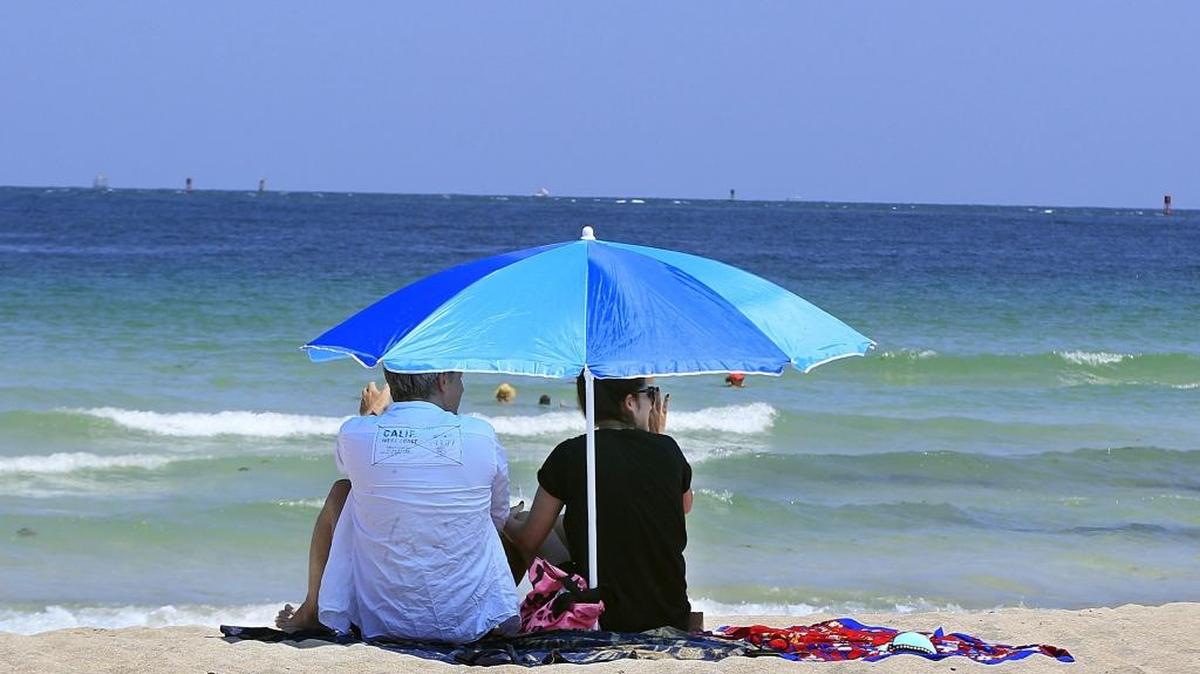 Considering the water quality in Miami Beach, you might just want to stay on the sand.
