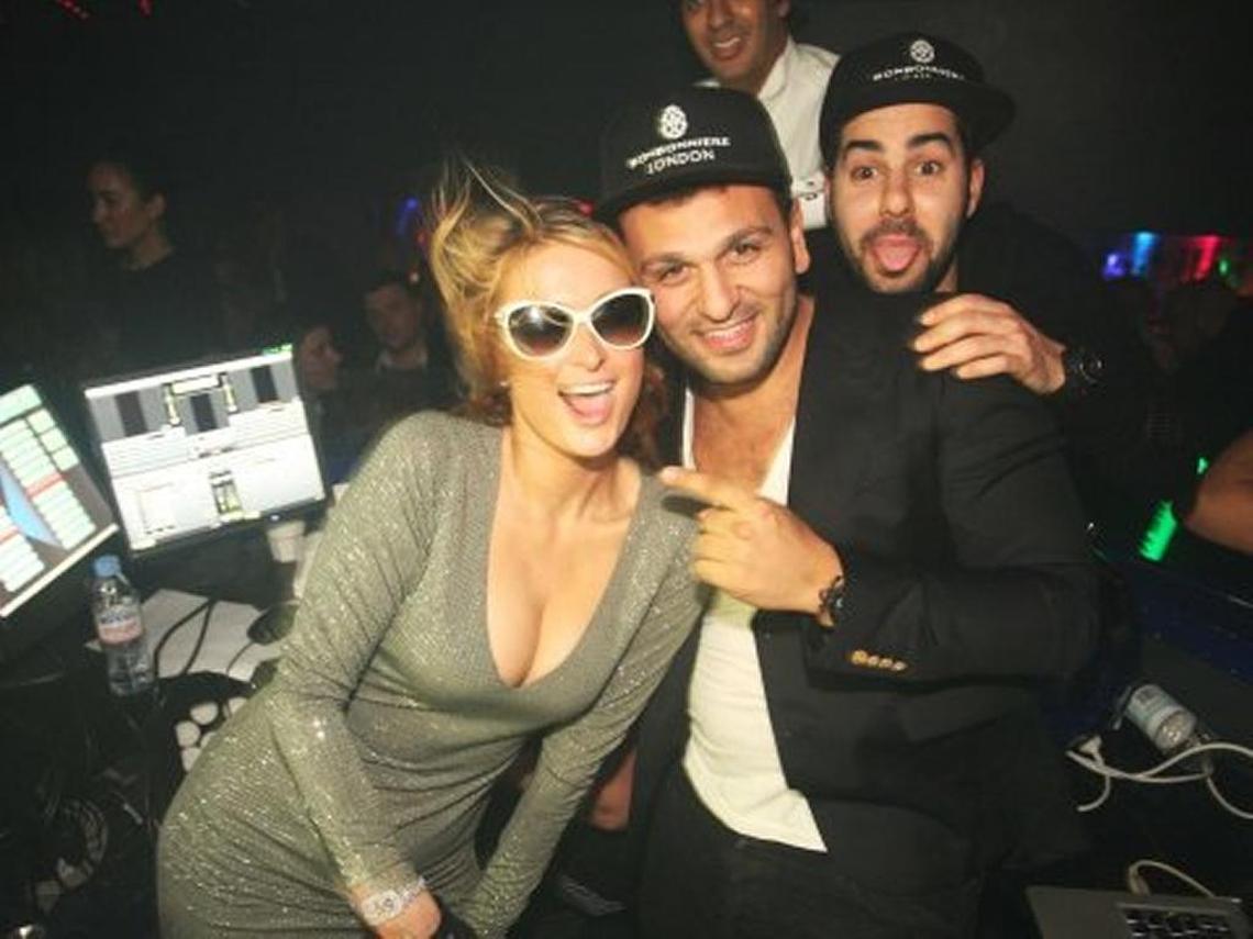 Joe Fournier, shown here with Paris Hilton, is being sued by Petter Hagland over a Miami Beach property investment. Fournier’s attorneys say the suit is without merit.