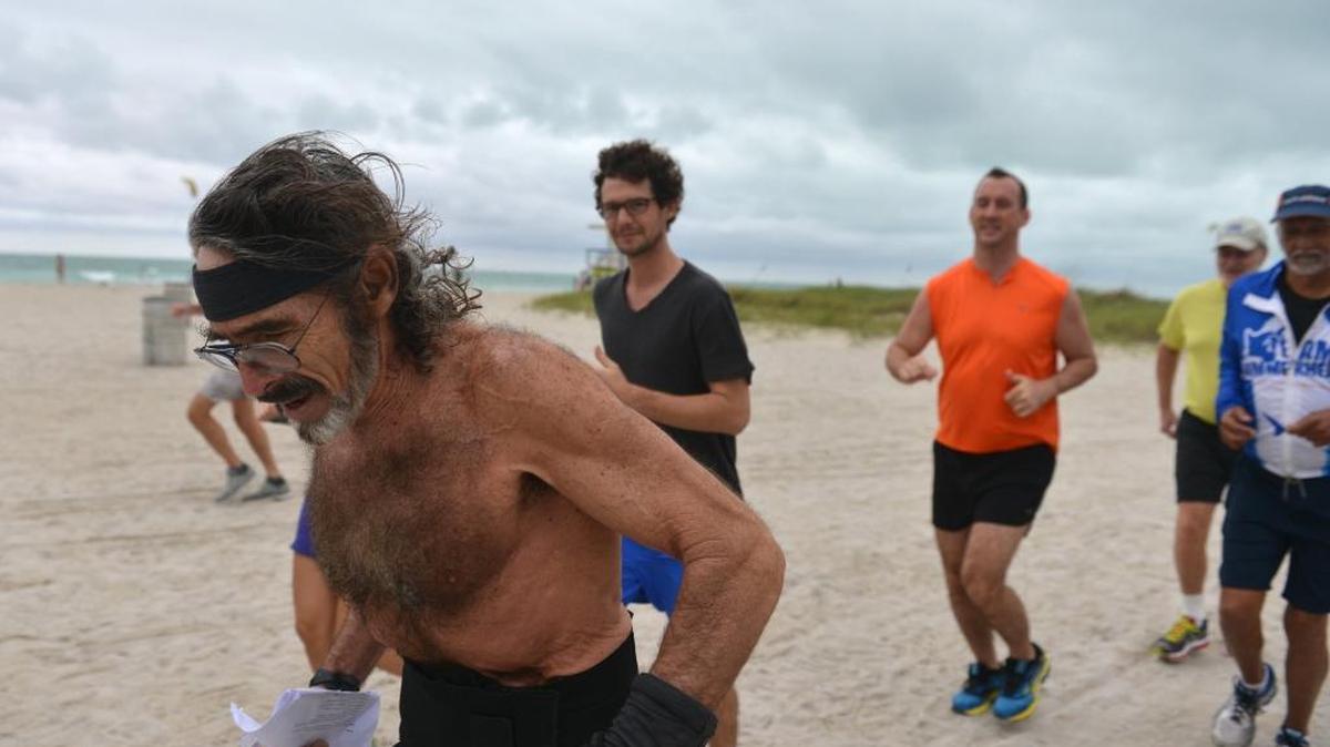 Robert "Raven" Kraft celebrates 39 years of Running with Raven on Dec. 31, 2013 starting at the Fifth Street lifeguard stand.