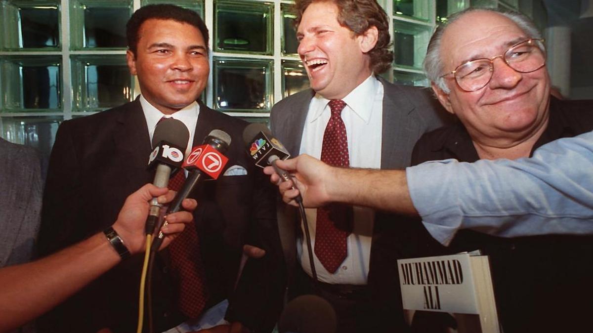 Muhammad Ali, Alex Douad, and Ferdie Pacheco at Miami International Airport.