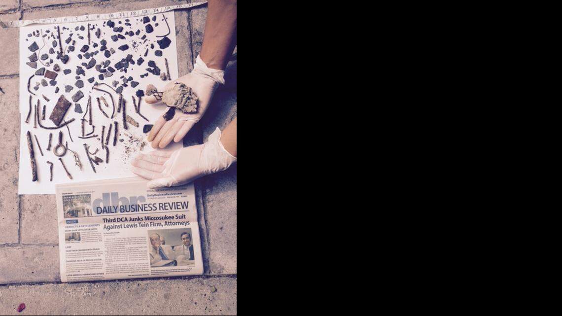 
A photo taken by Debbie Cimadevilla, a 15-year resident of Surfside. She claims this photo shows metal debris found in dry sand and in the water at low tide. Cimadevilla is one of the residents who believe the quickest, most efficient and only solution to eliminating the construction debris from the town’s beach is to scrape the existing sand, place it into the dunes or move the sand off-site, and replace the fill with Ortona sand, with a munsell value of 7 or greater. 
