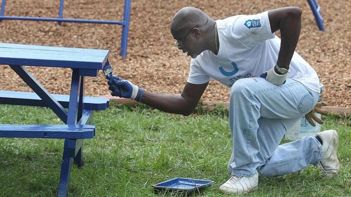 
Clarence Burts was one of about 150 DirecTV and AT&T employees who came together Wednesday, Oct. 7, 2015 to remodel His House Children's Home, an organization that works with about 160 children who have been abused, abandoned or orphaned.
