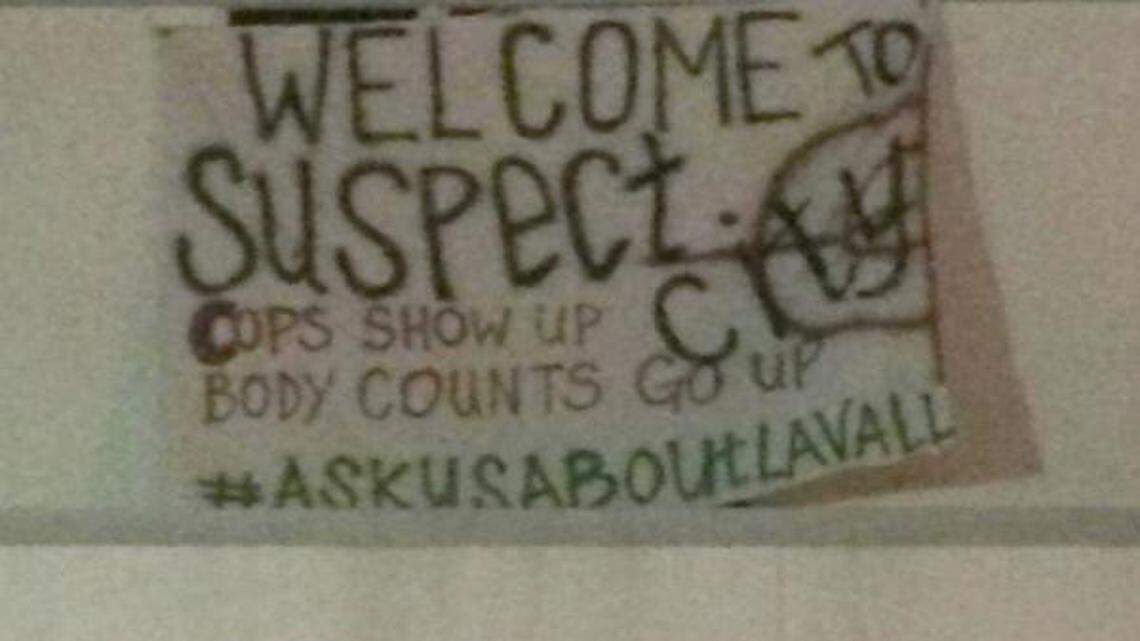 
A sign was posted above an entrance to Miami Gardens City Hall Wednesday night says “Welcome to Suspect City.” Police don’t know who placed it there.
