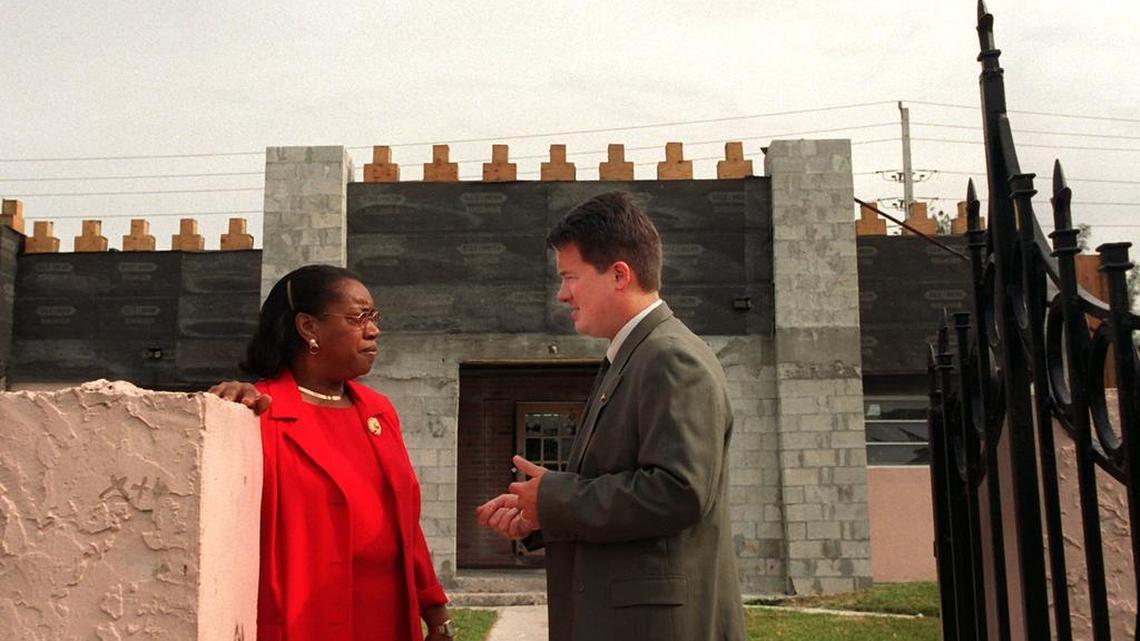 Then Miami-Dade County Manager Steve Shiver speaking with Opa-locka Mayor Myra Taylor on a tour of the city in 2001.