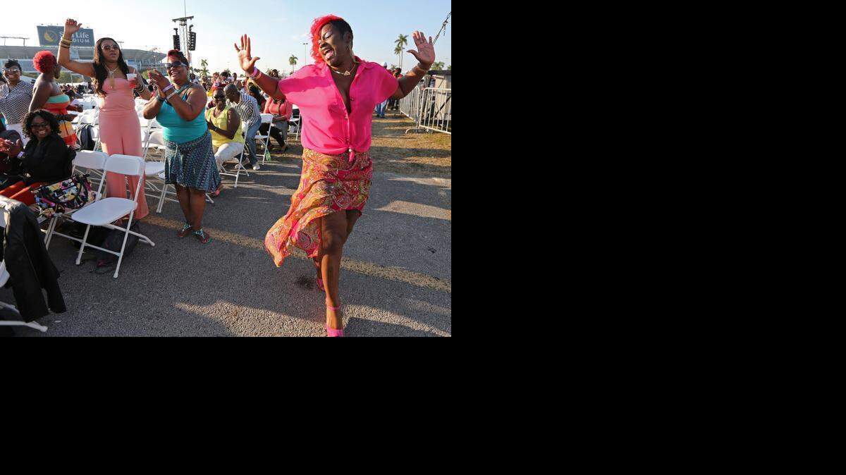
Vickie Rolle dances during the 2013 Jazz in the Gardens festival at Sun Life Stadium in Miami Gardens.
