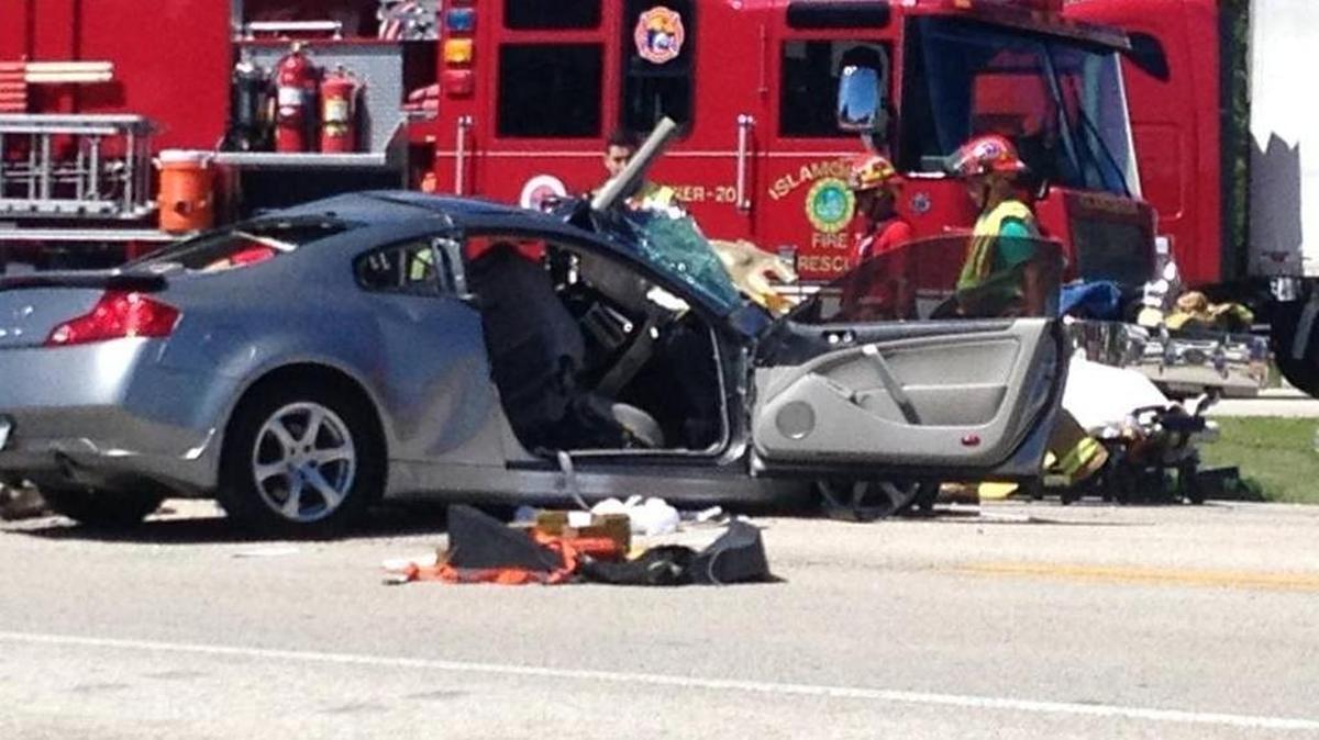 Islamorada Fire-Rescue firefighters and Florida Highway Patrol troopers respond to a fatal car crash at mile marker 87 in Islamorada Friday afternoon.