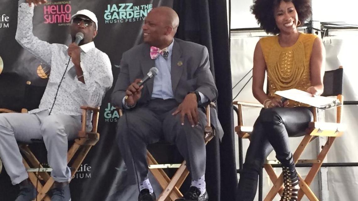 From left, host Rickey Smiley, Miami Gardens Mayor Oliver Gilbert III and WPBT Channel 2 host Kalyn James preview the weekend Jazz in the Gardens music festival at the site on Friday, March 18, 2016.
