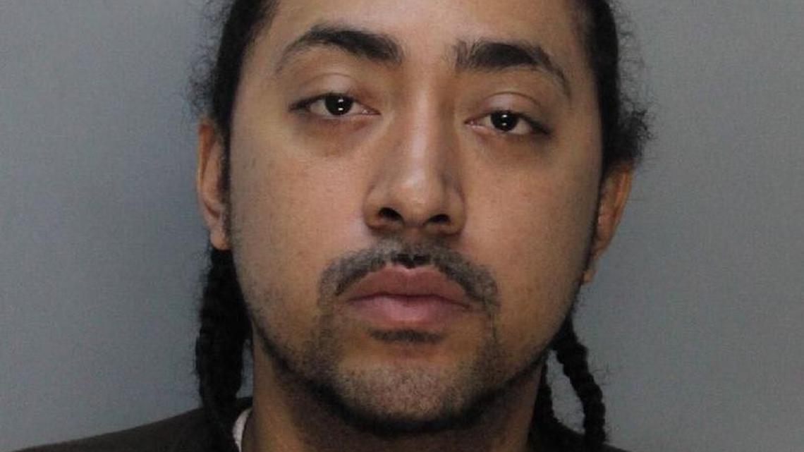 Arturo Exum turned himself in Tuesday morning. Police say he fatally shot Chili’s Grill & Bar employee Lester Reid Monday afternoon at a Miami Gardens Chili’s.