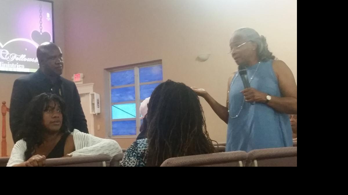 
Patricia Graham Marks, right, asks a question as Miami Gardens Councilman Erhabor Ighodaro, left, listens during a community meeting Wednesday night at Love Fellowship Ministries in Miami Gardens, in the Bunche Park neighborhood.
