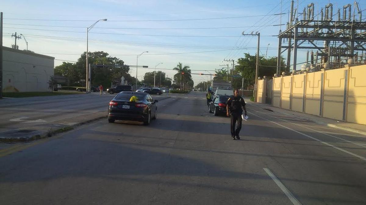 Two suspects have been taken into custody after a shooting at Opa-locka Boulevard and NW 22nd Avenue.