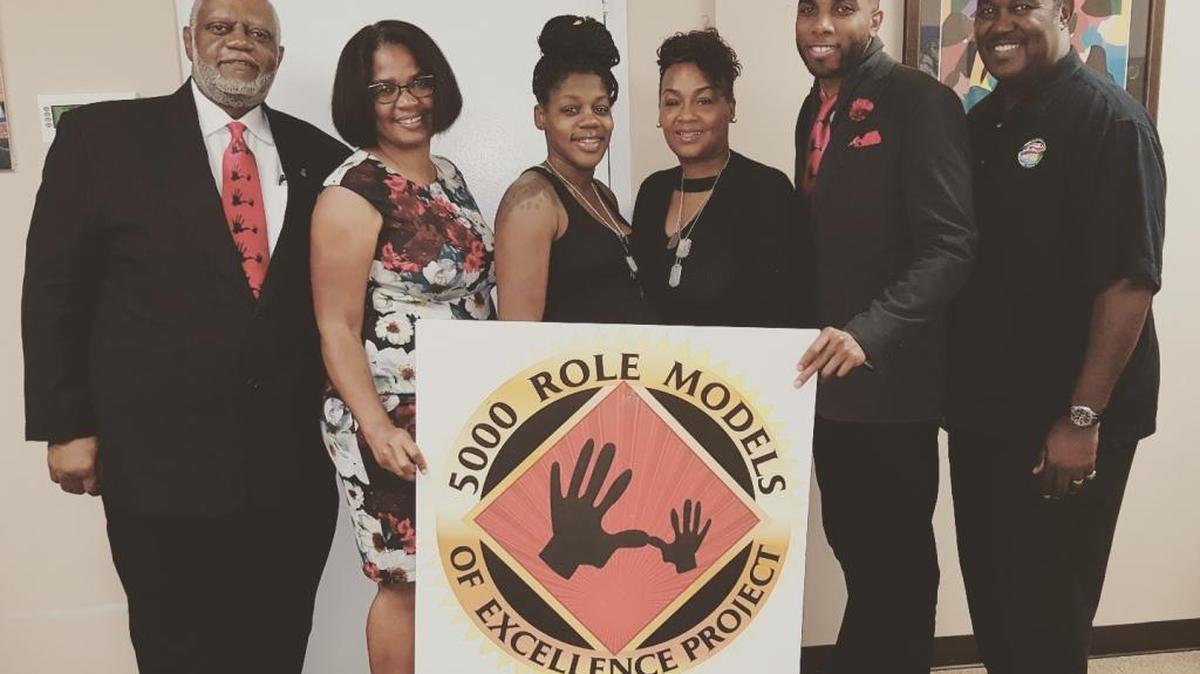 Dr. Wilbert T. Holloway, chairman of the 5000 Role Models of Excellence Project Foundation; Marva Wiley; Myeshia Johnson, Army Sgt. LaDavid Johnson’s wife and mother of their children; Cowanda Jones-Johnson, Sgt. Johnson’s mother; Jamal Engram, communications officer at the 5000 Role Models of Excellence Project Foundation; and JD Patterson, assistant police director and president of the 5000 Role Models of Excellence Project Foundation.