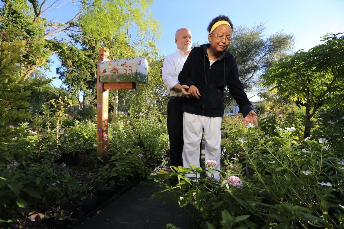 Tom Carroll and Hermine Ricketts in their front yard in Miami Shores on Dec. 13, 2017. The couple had to dig up their vegetable garden in their front yard, which they had for 17 years, after the Village of Miami Shores ruled their edible plants were not allowed to grow there. The couple took their case to the Florida Supreme Court. Florida Senate SB 1776, filed on Jan. 5, 2018, argues that vegetable gardens at private homes are good for the state.